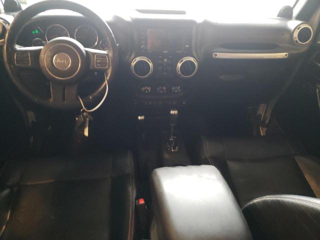 1C4BJWEGXCL253571 - 2012 JEEP WRANGLER U SAHARA SILVER photo 8