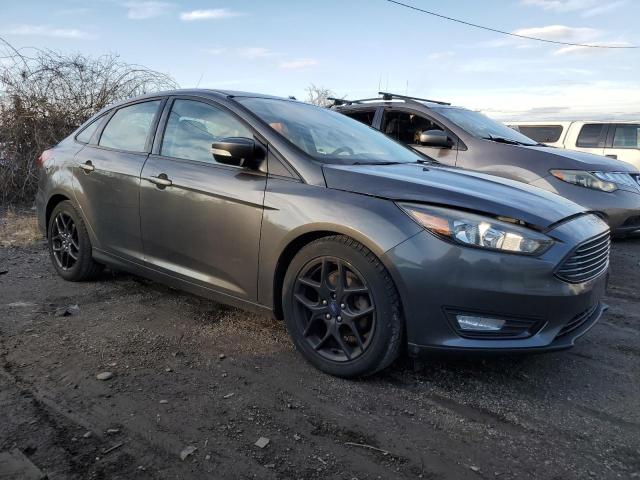 1FADP3FE1GL314403 - 2016 FORD FOCUS SE GRAY photo 4