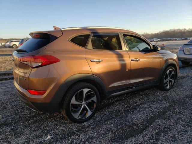 KM8J33A21GU039109 - 2016 HYUNDAI TUCSON LIMITED ORANGE photo 3