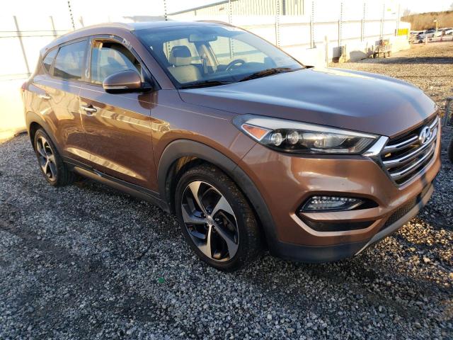 KM8J33A21GU039109 - 2016 HYUNDAI TUCSON LIMITED ORANGE photo 4