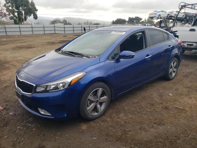 3KPFL4A77JE278083 - 2018 KIA FORTE LX BLUE photo 1