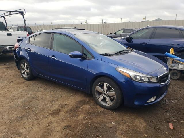 3KPFL4A77JE278083 - 2018 KIA FORTE LX BLUE photo 4