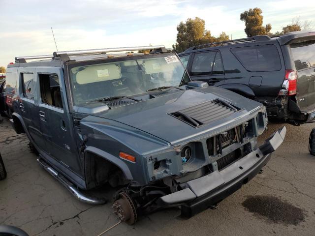 5GRGN23U85H112028 - 2005 HUMMER H2 GRAY photo 4