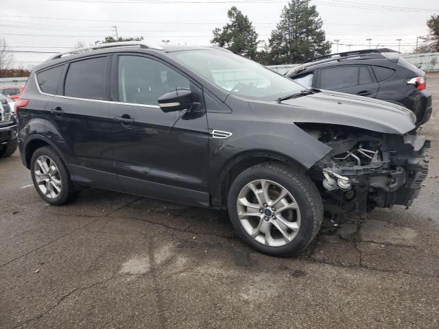 1FMCU0JX7EUD50394 - 2014 FORD ESCAPE TITANIUM BLACK photo 4