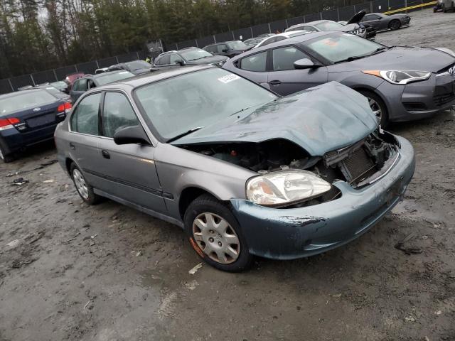 2HGEJ6579XH536593 - 1999 HONDA CIVIC LX GRAY photo 4