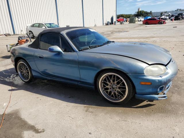 JM1NB3539X0135668 - 1999 MAZDA MX-5 MIATA BLUE photo 4