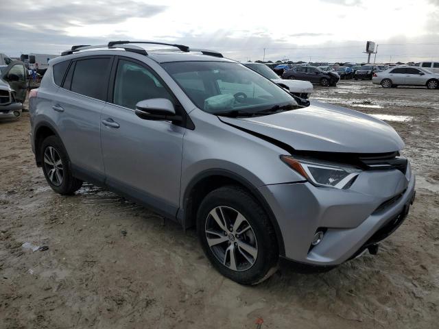 2T3WFREV3GW301210 - 2016 TOYOTA RAV4 XLE SILVER photo 4