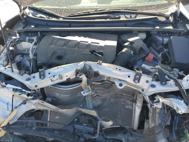 5YFBURHE8HP679907 - 2017 TOYOTA COROLLA L SILVER photo 11