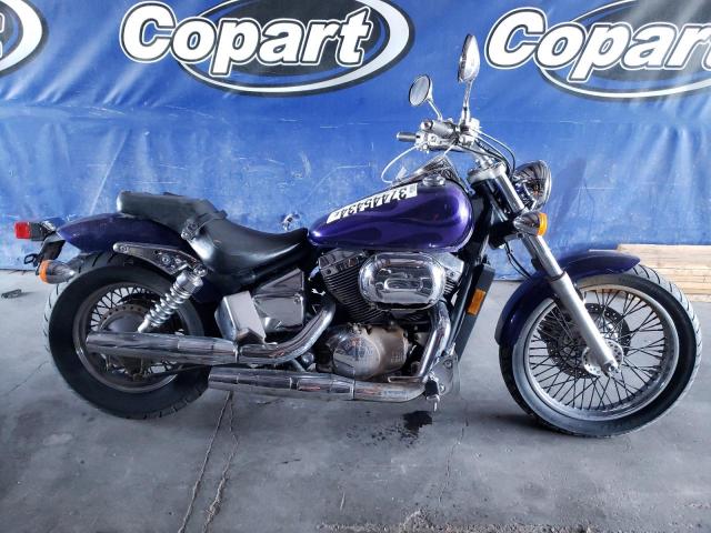 JH2RC44553M700709 - 2003 HONDA VT750 DCB PURPLE photo 9