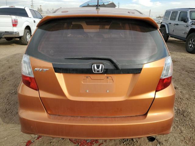 JHMGE8H43AS007826 - 2010 HONDA FIT SPORT ORANGE photo 6