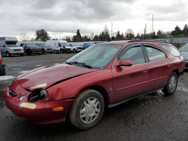 1FAFP58S7XG307018 - 1999 FORD TAURUS SE COMFORT RED photo 1