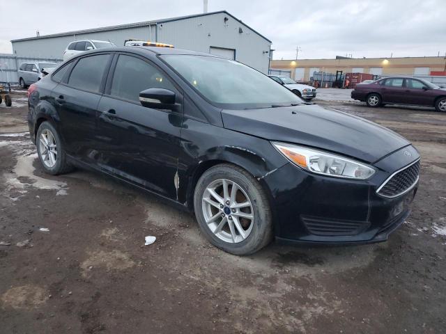 1FADP3F28FL377048 - 2015 FORD FOCUS SE BLACK photo 4