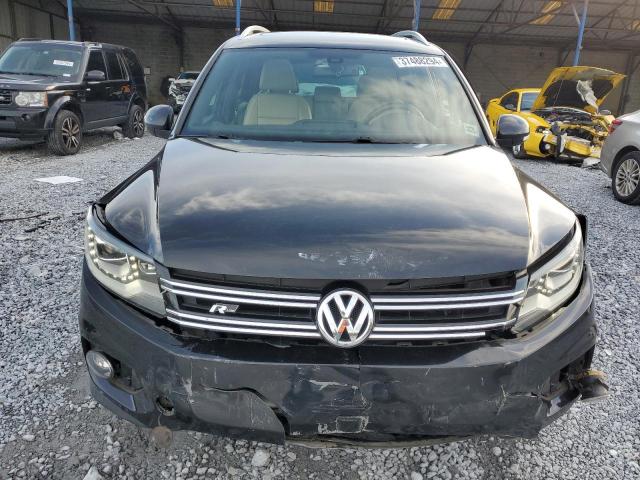 WVGAV3AX8EW062135 - 2014 VOLKSWAGEN TIGUAN S BLACK photo 5