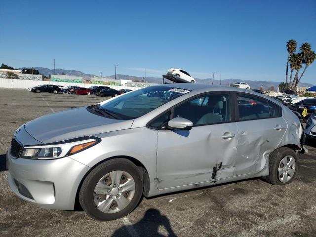 3KPFL4A75JE218223 - 2018 KIA FORTE LX SILVER photo 1