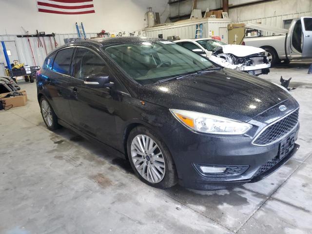 1FADP3K29FL353864 - 2015 FORD FOCUS SE BLACK photo 4