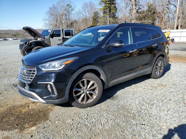 KM8SN4HF5HU167416 - 2017 HYUNDAI SANTA FE SE BLACK photo 1