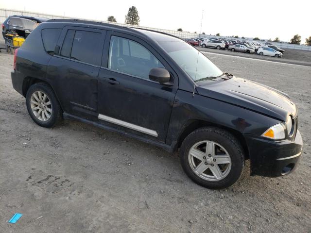 1J8FT47048D778815 - 2008 JEEP COMPASS SPORT BLACK photo 4