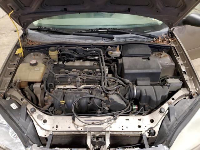 1FAFP34N95W151684 - 2005 FORD FOCUS ZX4 TAN photo 11