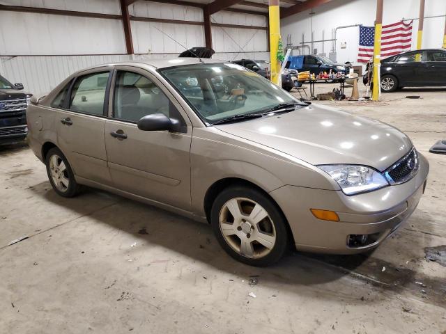 1FAFP34N95W151684 - 2005 FORD FOCUS ZX4 TAN photo 4