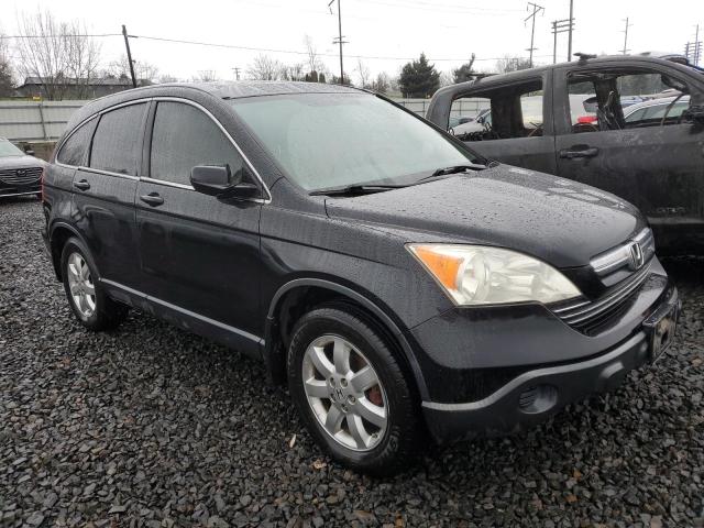 JHLRE38797C057353 - 2007 HONDA CR-V EXL BLACK photo 4