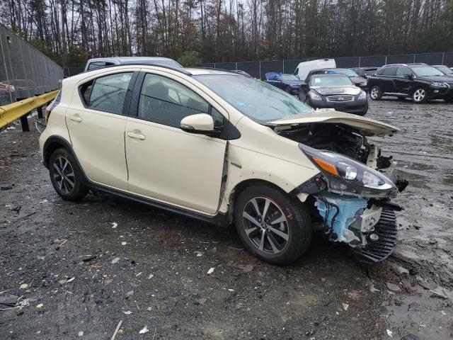 JTDKDTB35J1618478 - 2018 TOYOTA PRIUS C BEIGE photo 4