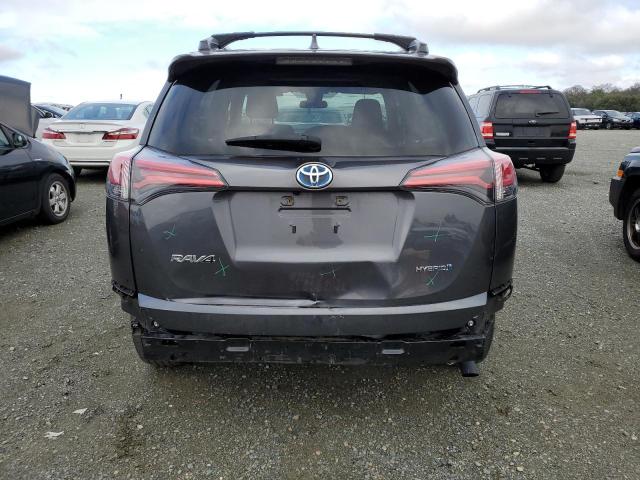 JTMRJREV8JD246981 - 2018 TOYOTA RAV4 HV LE CHARCOAL photo 6