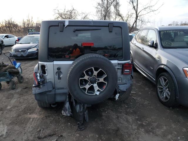 1C4BJWDG9GL108061 - 2016 JEEP WRANGLER U SPORT ვერცხლისფერი ფოტო 6