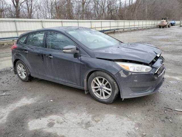 1FADP3K2XHL275906 - 2017 FORD FOCUS SE BLACK photo 4