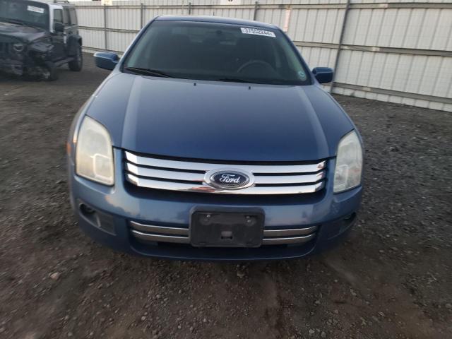 3FAHP07Z69R148868 - 2009 FORD FUSION SE BLUE photo 5