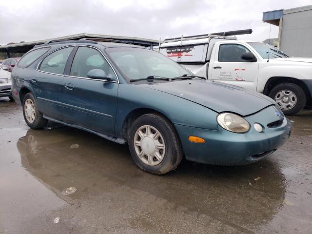 1FALP57U0VG218054 - 1997 FORD TAURUS GL GREEN photo 4