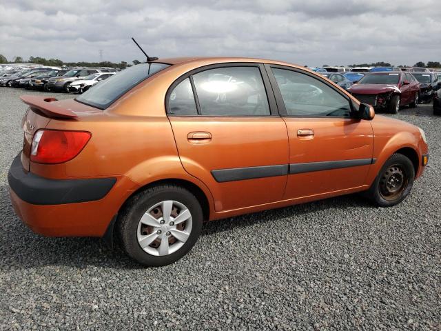 KNADE223796564354 - 2009 KIA RIO BASE ORANGE photo 3