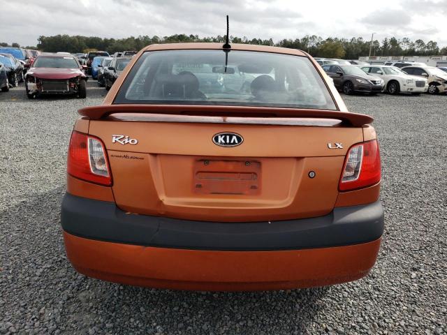 KNADE223796564354 - 2009 KIA RIO BASE ORANGE photo 6