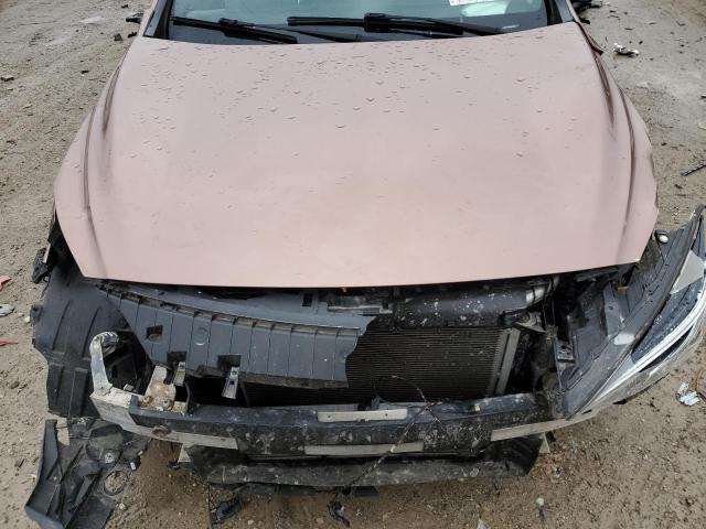 SJKCH5CR7HA021024 - 2017 INFINITI QX30 BASE PINK photo 12