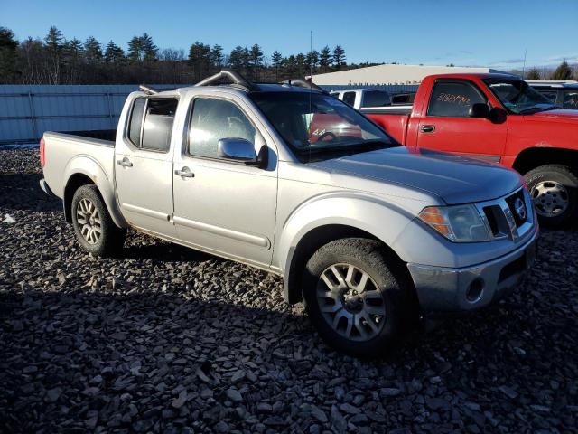 1N6AD0EV1BC434097 - 2011 NISSAN FRONTIER S SILVER photo 4