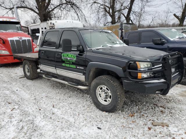 1GCGK23U24F138693 - 2004 CHEVROLET SILVERADO K2500 BLACK photo 4