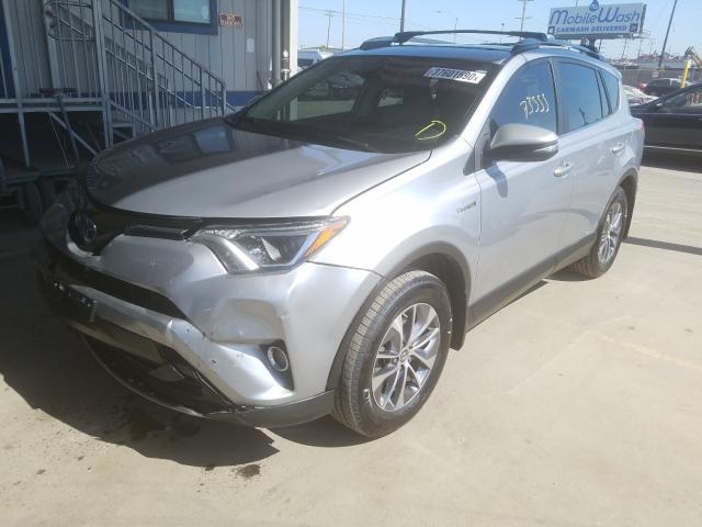 JTMRJREV7HD103028 - 2017 TOYOTA RAV4 HV LE  photo 2