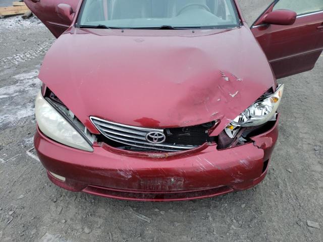 4T1BF32K36U114966 - 2006 TOYOTA CAMRY LE RED photo 11