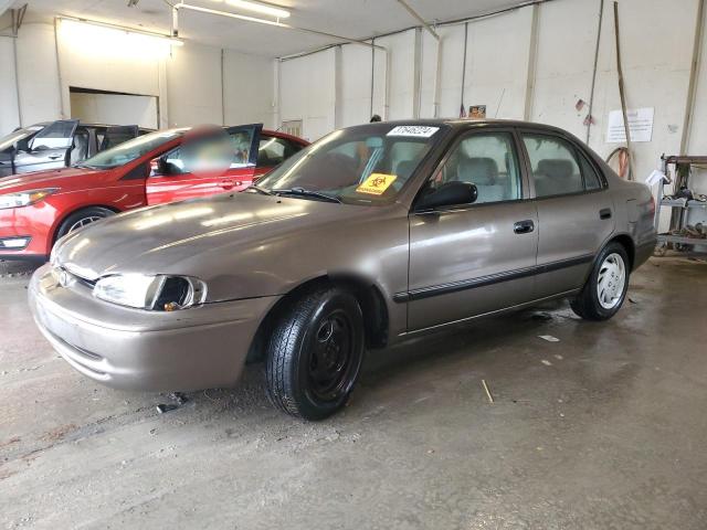 1Y1SK5286XZ420673 - 1999 CHEVROLET GEO PRIZM BASE GRAY photo 1