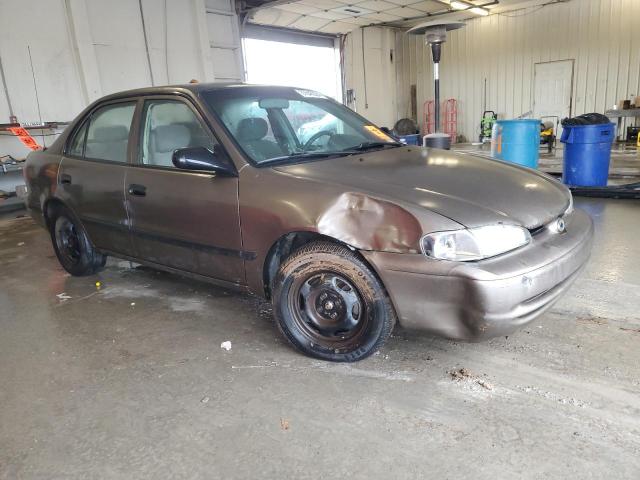 1Y1SK5286XZ420673 - 1999 CHEVROLET GEO PRIZM BASE GRAY photo 4