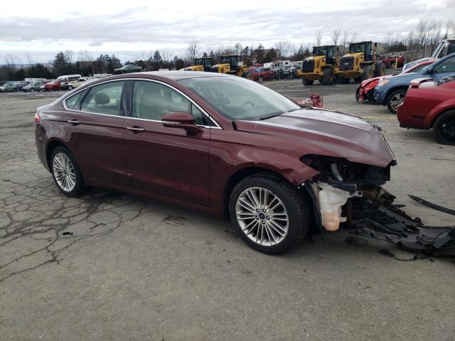 3FA6P0HD7GR286734 - 2016 FORD FUSION SE MAROON photo 4