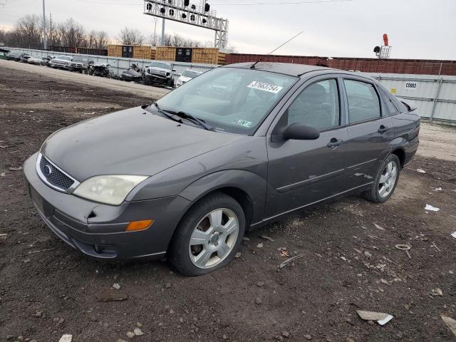 1FAFP34N07W307954 - 2007 FORD FOCUS ZX4 GRAY photo 1