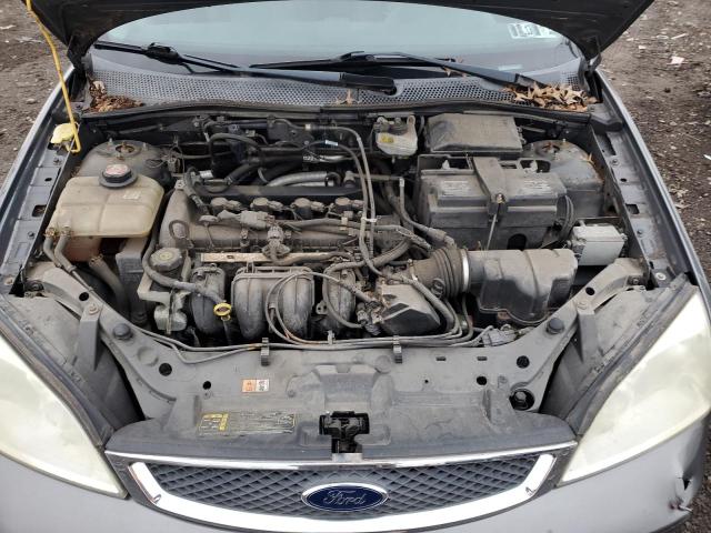 1FAFP34N07W307954 - 2007 FORD FOCUS ZX4 GRAY photo 11