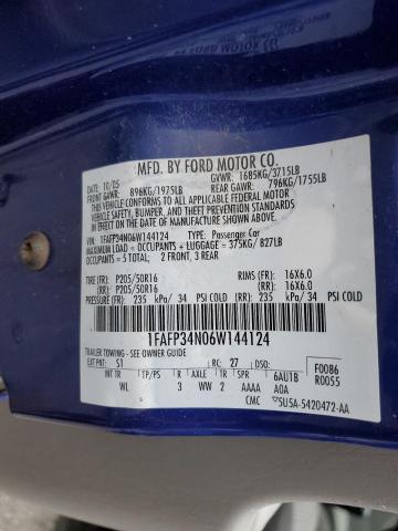 1FAFP34N06W144124 - 2006 FORD FOCUS ZX4 BLUE photo 12