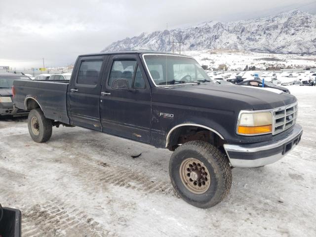 2FTJW36H5NCA65296 - 1992 FORD F350 BLACK photo 4