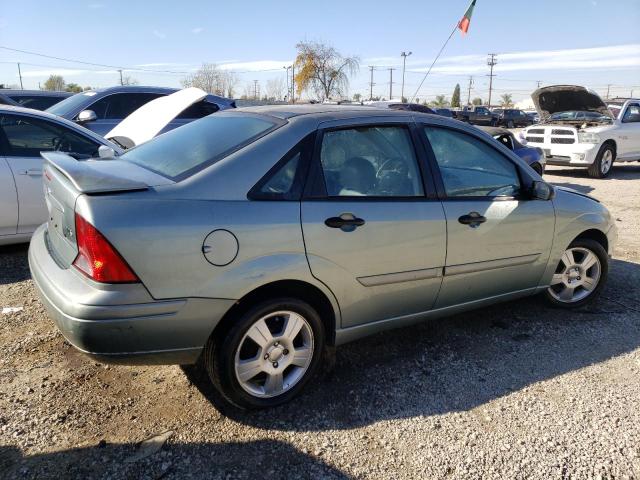 1FAFP38Z04W184200 - 2004 FORD FOCUS ZTS GRAY photo 3