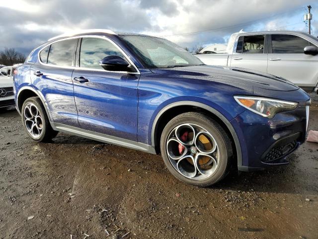 ZASPAKBN6K7C52899 - 2019 ALFA ROMEO STELVIO TI BLUE photo 4