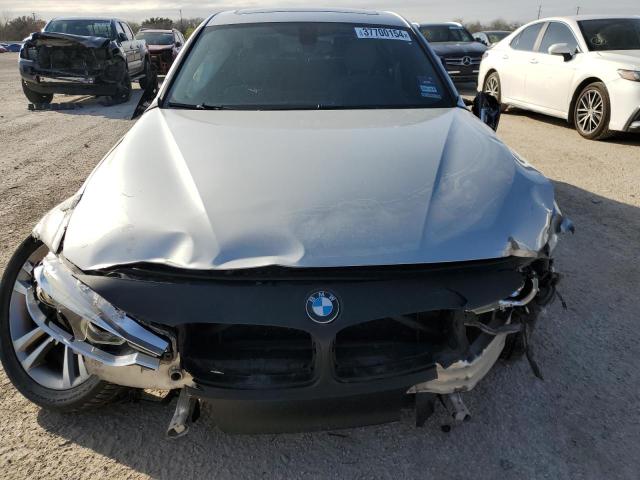 WBA8B3G55HNU35012 - 2017 BMW 340 I Gümüş foto 5