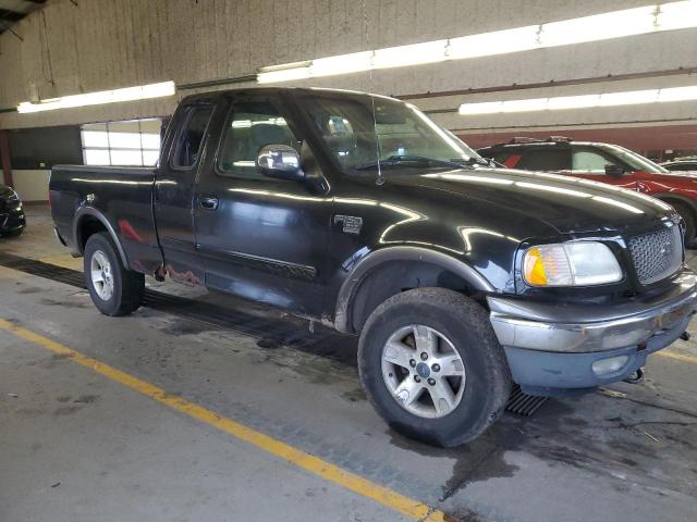 1FTRX18L62NB83790 - 2002 FORD F150 BLACK photo 4