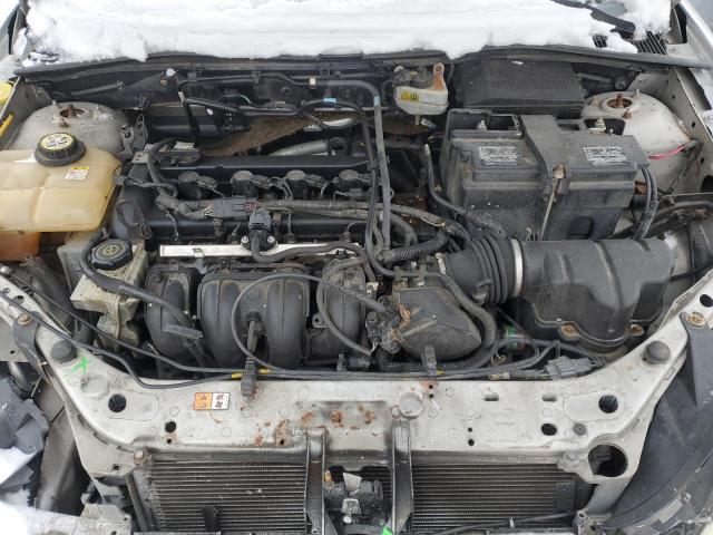 1FAHP34N26W184648 - 2006 FORD FOCUS ZX4 SILVER photo 11