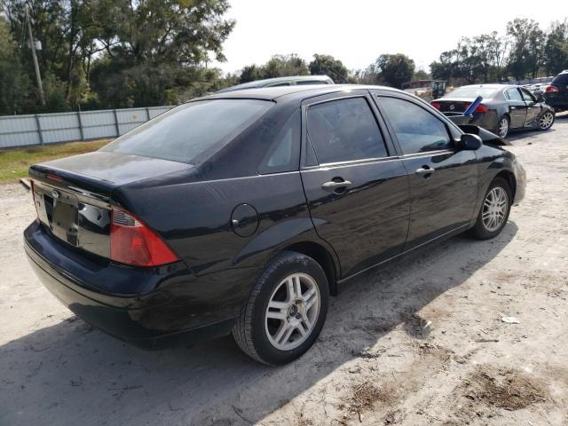 1FAHP34NX7W314547 - 2007 FORD FOCUS ZX4 BLACK photo 3